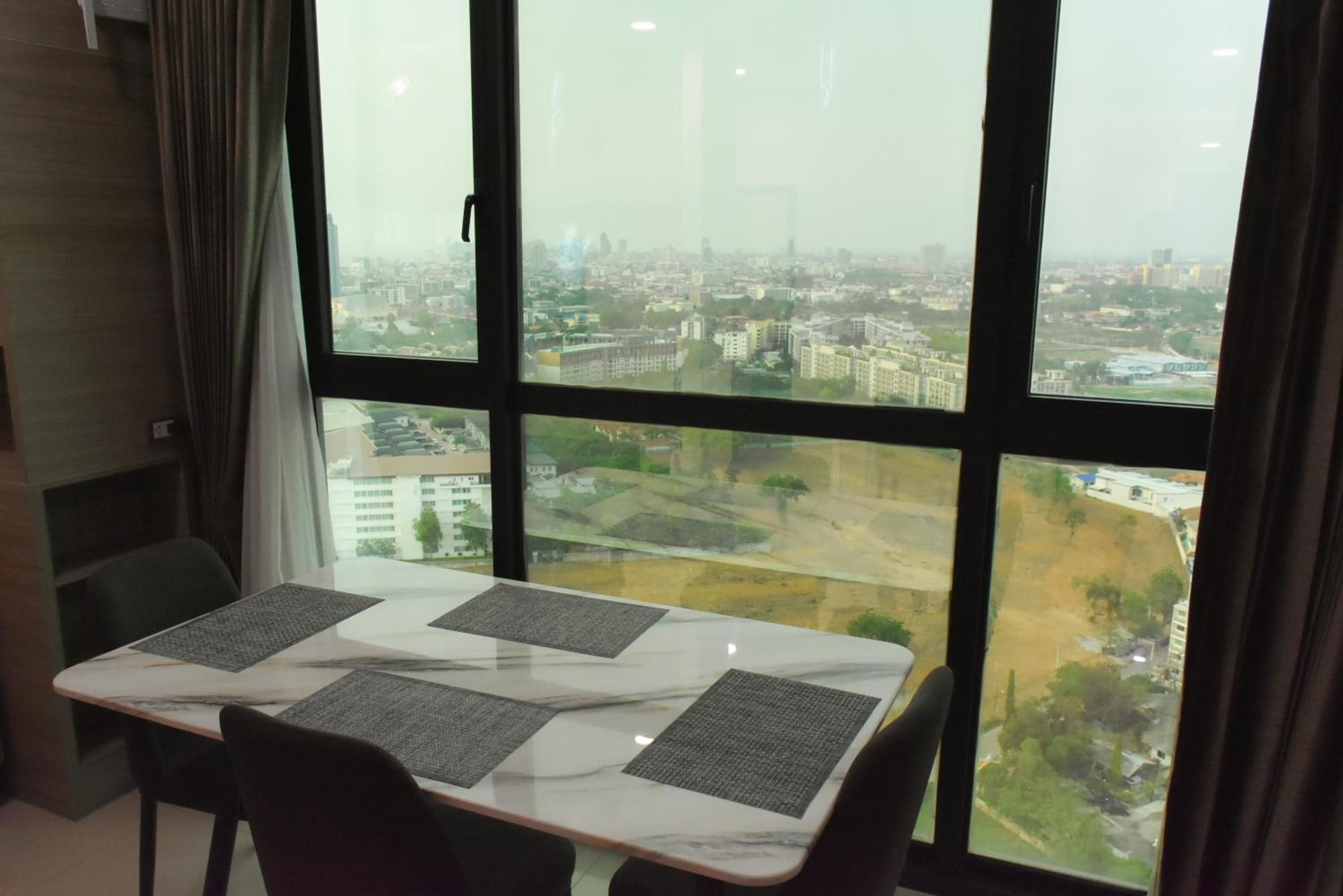 Dusit Grand Condo View Jomtien Beach Rum bild