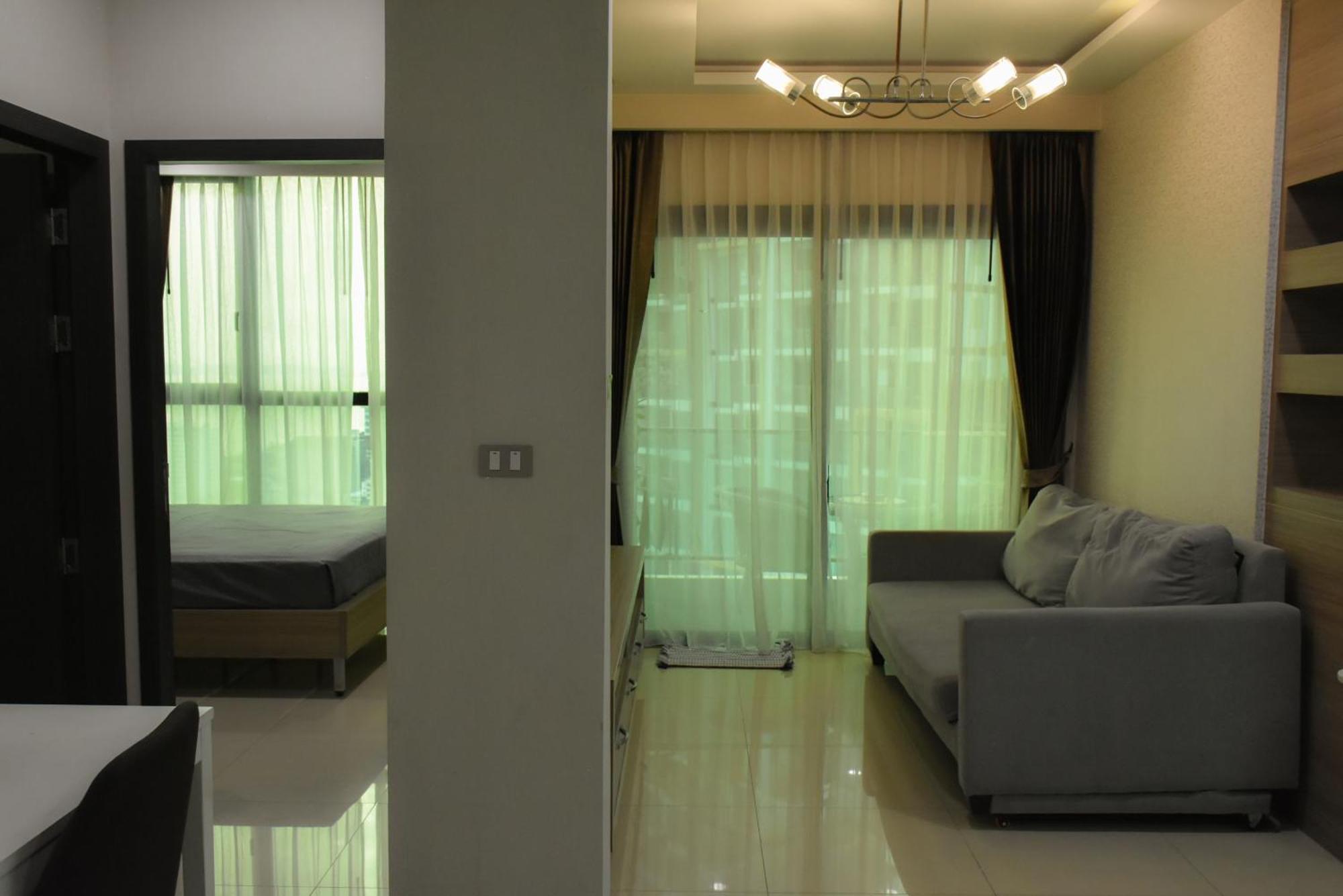 Dusit Grand Condo View Jomtien Beach Rum bild