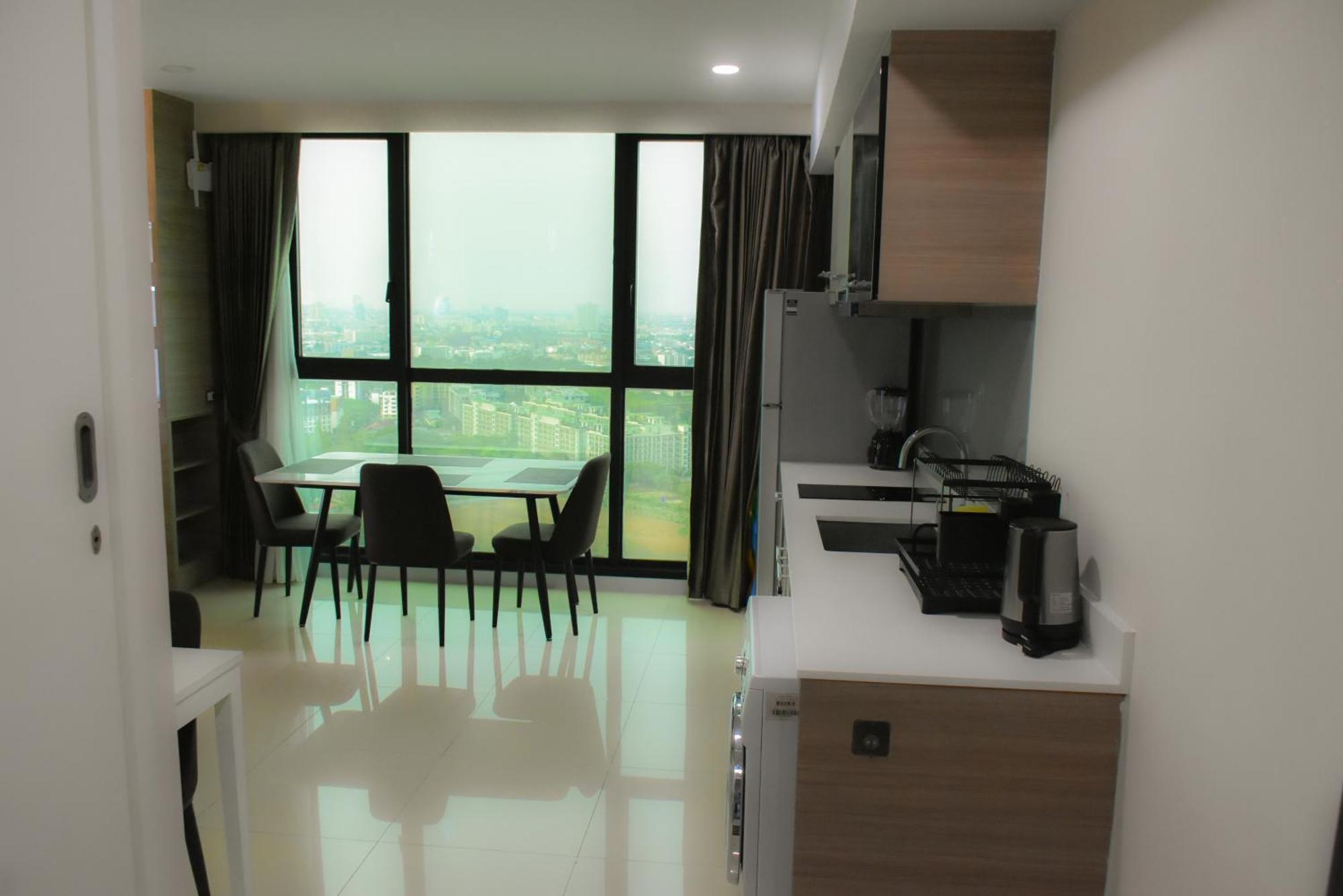 Dusit Grand Condo View Jomtien Beach Rum bild